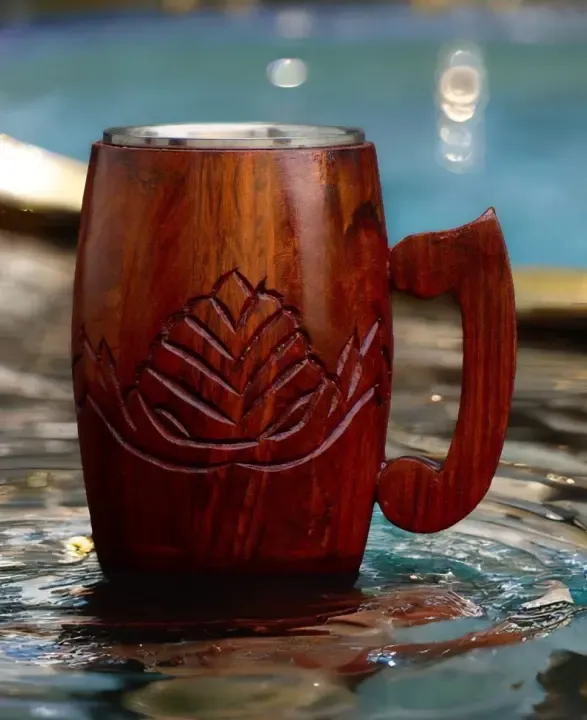 this is the beautiful and best handmade wooden coffee mug with stainless steel inside. It is handcrafted by the best artisans and engraved by hand. By the best handcrafted wooden coffee mug on www.agrrro.com.