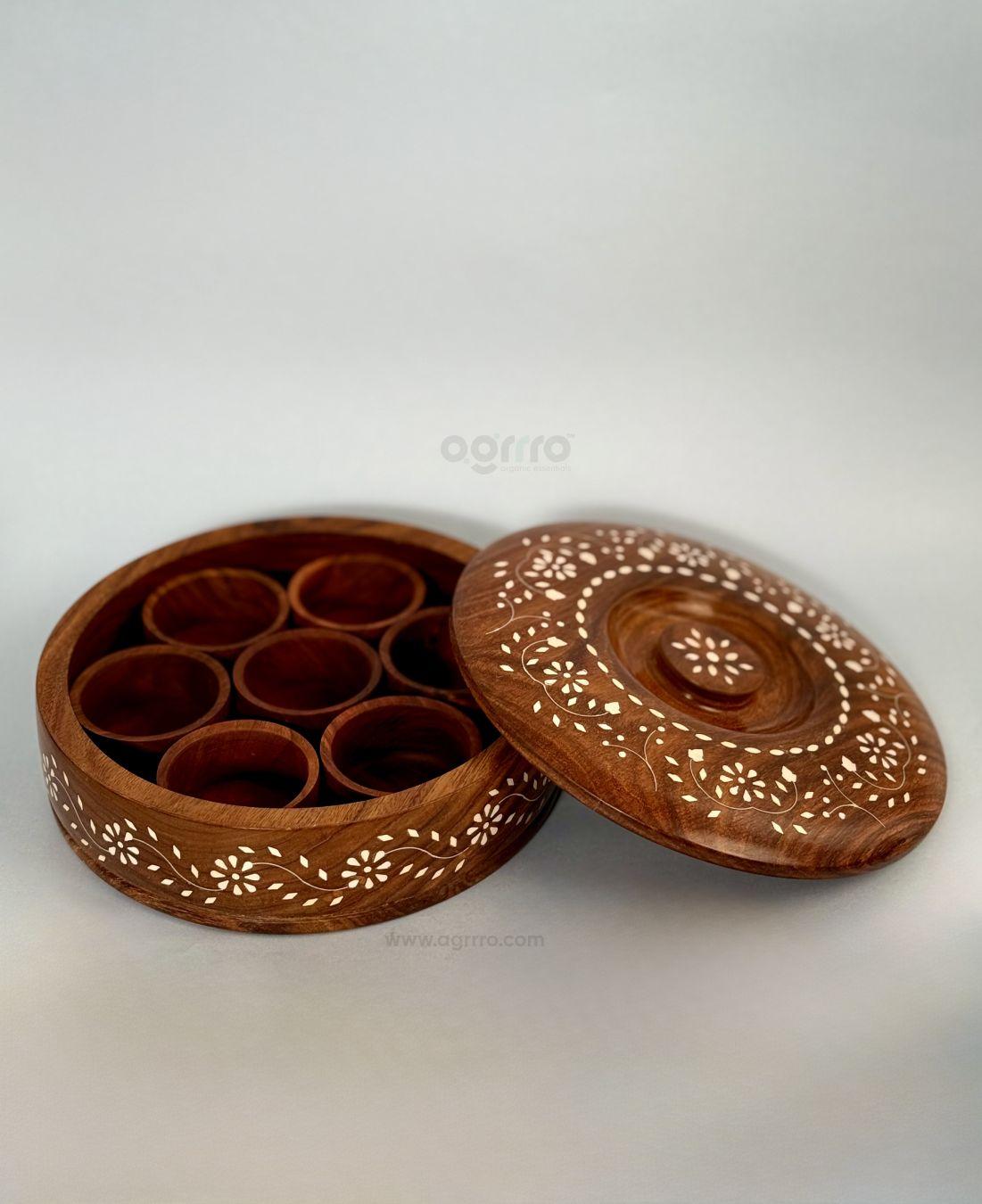 this is the beautiful and best handcrafted wooden round masala box, best handcrafted masala box for kitchenware lovers. Buy world's best handcrafted round masala box or masala storage on www.agrrro.com. This is the best way to enjoy dinner with your loved ones.