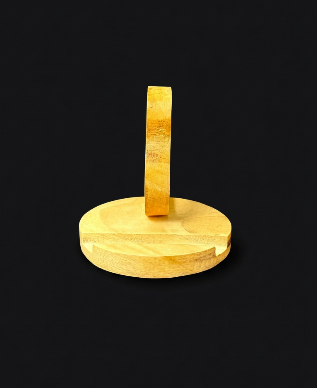 Handcrafted wooden heart-shaped phone stand holding a smartphone on a natural wooden base