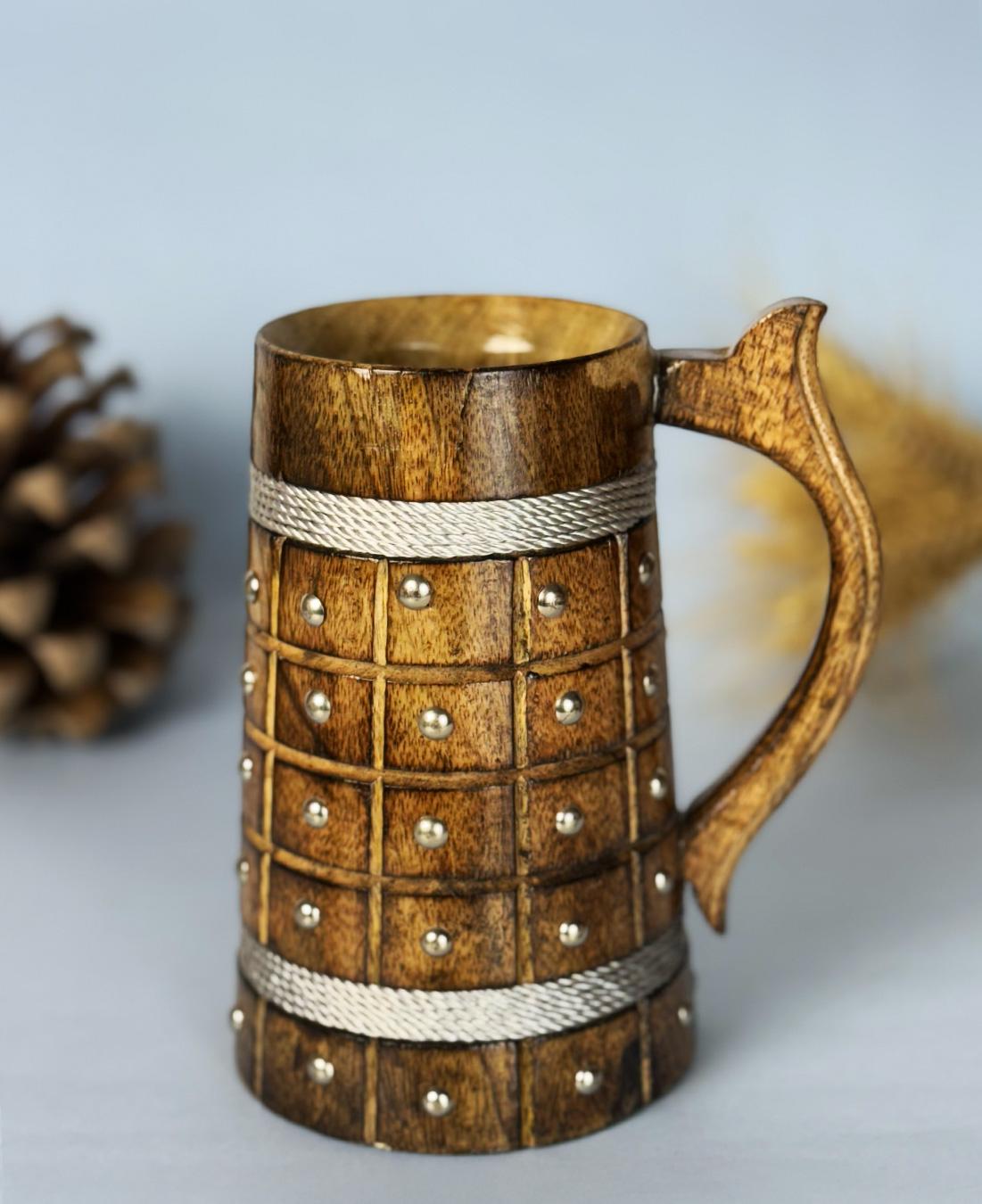 this is the beautiful and best handcrafted wooden beer mug for beer lovers and home decor lovers made of eco friendly mango wood and packed in eco friendly plastic free packaging. Buy the best quality handcrafted wooden beer mug on agrrro.com.