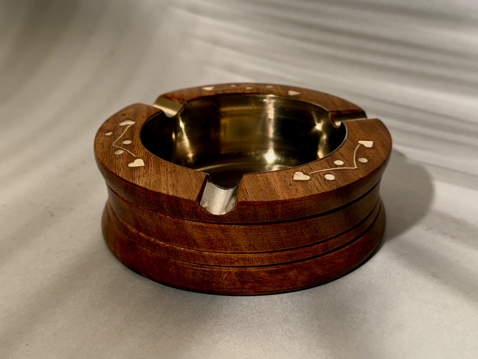 Handcrafted wooden ashtray with brass lining and inlay design
